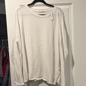 Cherish White light weight sweater. Split hem. Oversized
